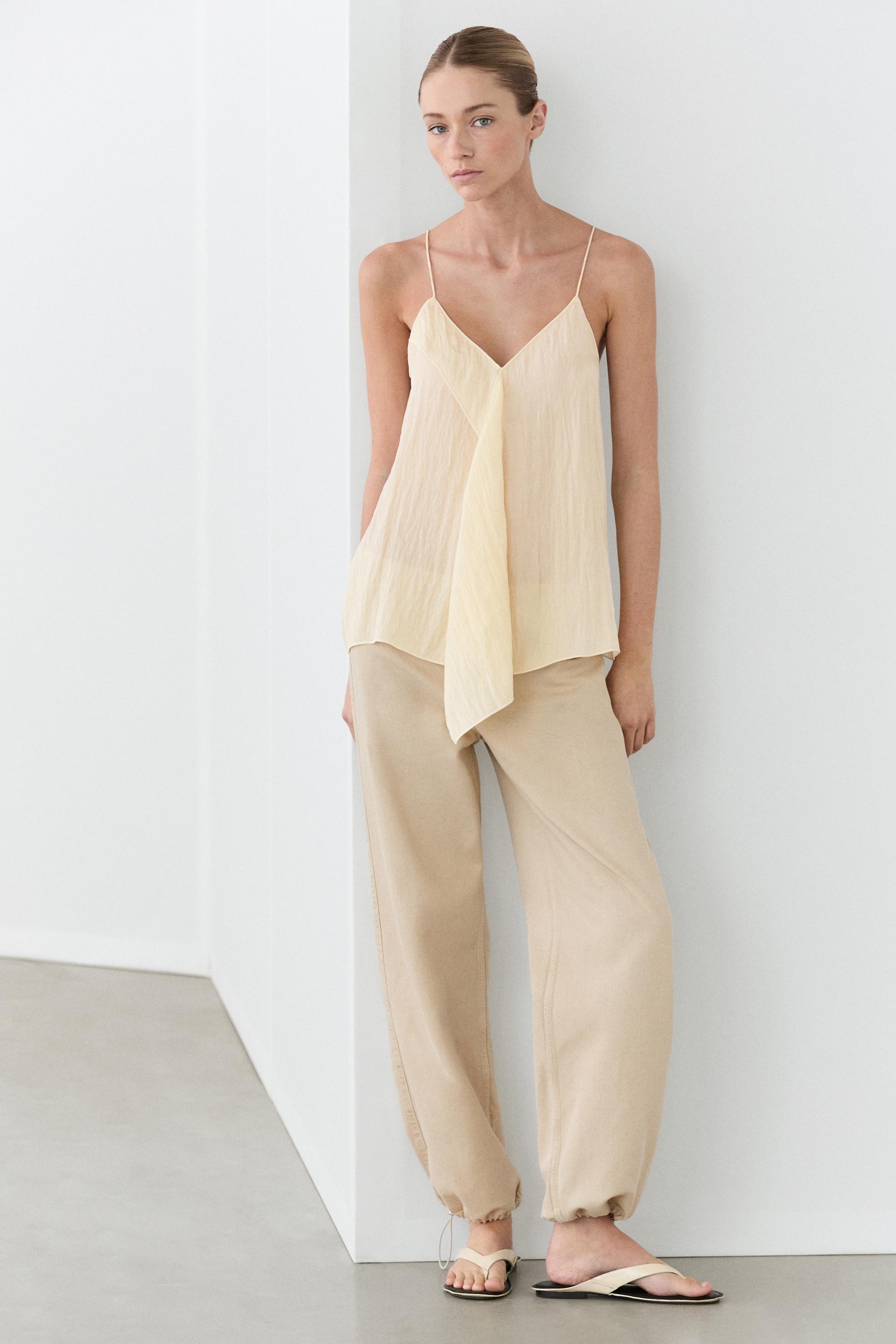 Strappy top with ruffle detail